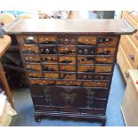 A CHINESE ELM FINISH MULTI DRAWER CHEST