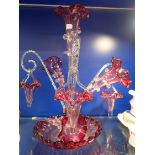 A VICTORIAN CRANBERRY GLASS EPERGNE