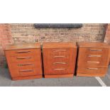 THREE G-PLAN TEAK CHESTS OF FOUR DRAWERS