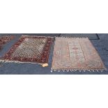 A SERAB STYLE RUG, AND A TURKISH RUG