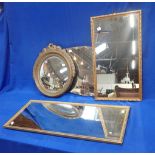 A GILT COMPOSITION EMPIRE STYLE CONVEX WALL MIRROR