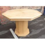 A MODERN LIGHT OAK OCTAGONAL DINING TABLE