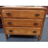 AN OAK ART DECO CHEST OF DRAWERS WITH BAKELITE HANDLES