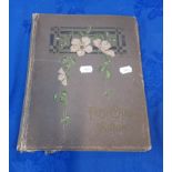 AN EARLY 20TH CENTURY GREY CLOTH POSTCARD ALBUM OF CANADIAN INTEREST