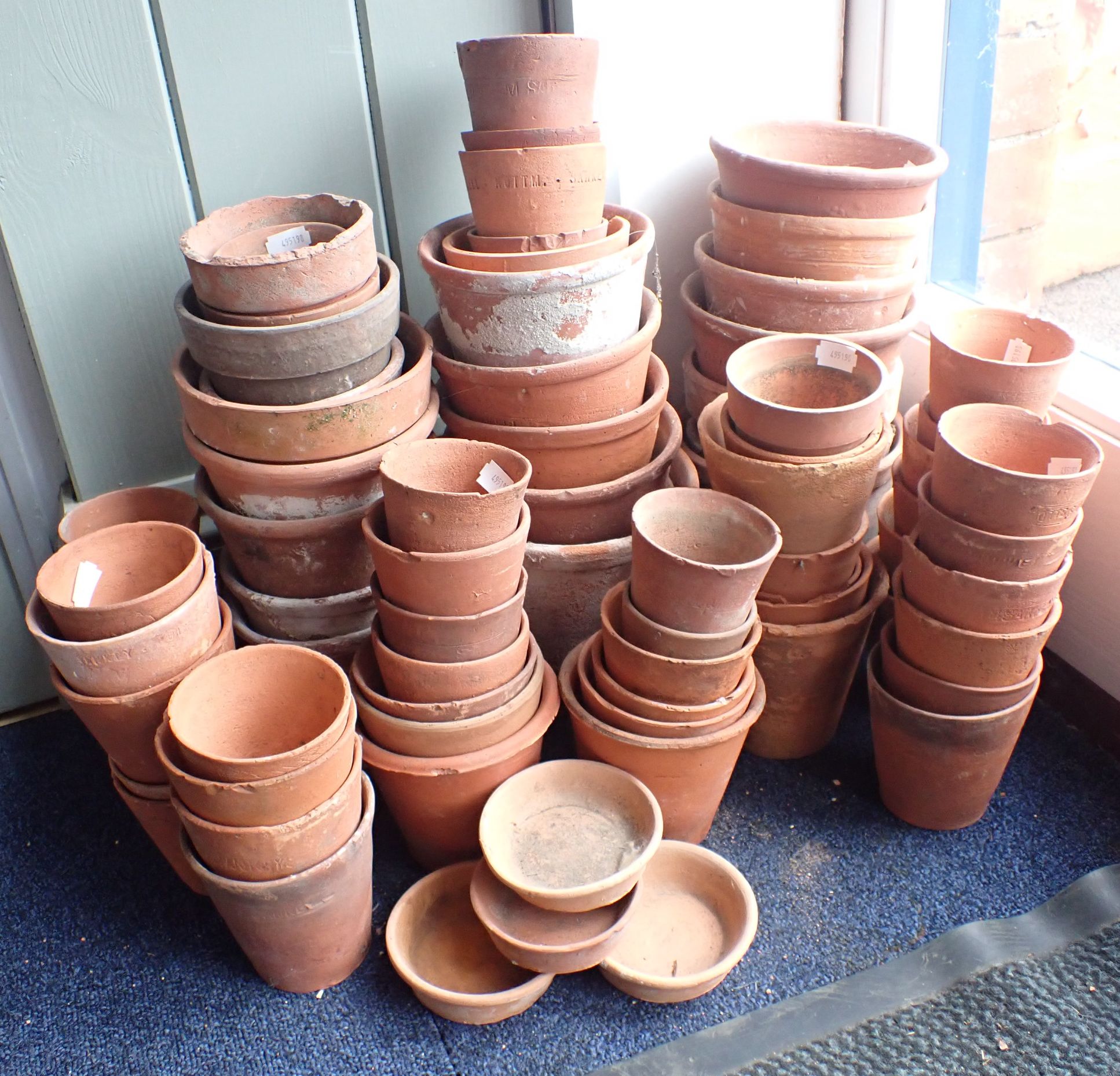 A COLLECTION OF VINTAGE CLAY FLOWERPOTS