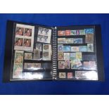 A COLLECTION OF WORLD STAMPS, IN A STOCK BOOK