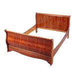 A MODERN CHERRY FINISH SLEIGH BED BY EXIGENCE