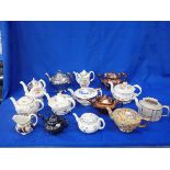 A COLLECTION OF 19TH CENTURY AND LATER TEAPOTS