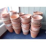 A COLLECTION OF VINTAGE CLAY FLOWERPOTS