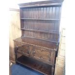 A 1920S OAK DRESSER, WITH POTBOARD BASE