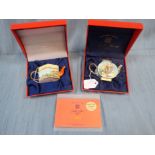 CHARLOTTE DI VITA COLLECTION (GOEBEL): TWO MINIATURE ENAMEL TEAPOTS