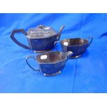 AN ART DECO THREE-PIECE SILVER TEA SET