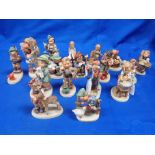 A COLLECTION OF GOEBEL HUMMEL FIGURES