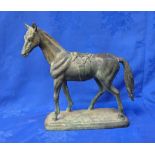 A PATINATED BRONZE HORSE