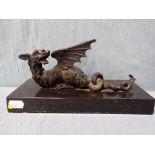 A CAST BRONZE GRYPHON OR DRAGON