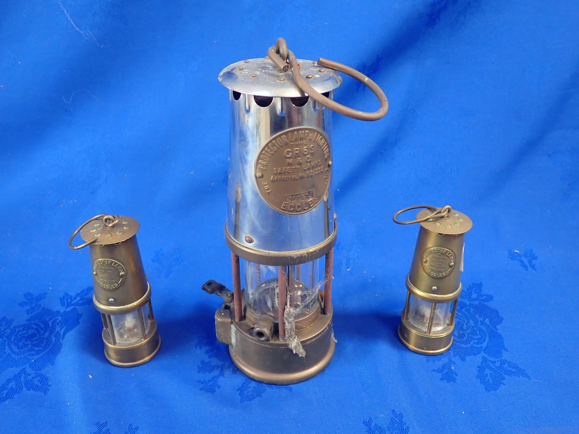 A MINER'S LAMP; 'THE PROTECTOR LAMP AND LIGHTING CO. LTD.'