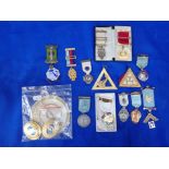 A COLLECTION OF SILVER AND METAL MASONIC MEDALS