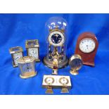 A EDWARDIAN BRASS REPEATING CARRIAGE CLOCK