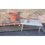 A WEATHERED TEAK GARDEN TABLE