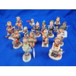 A COLLECTION OF GOEBEL HUMMEL FIGURES