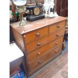 A VICTORIAN MAHOGANY CHEST OF DRAWERS