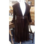 A 1940S BROWN VELVET EVENING COAT