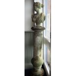 A RECONSTITUTED STONE GARDEN COLUMN AND BUST