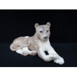 A COPENHAGEN PORCELAIN FIGURE OF A LION CUB