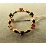 9CT YELLOW GOLD SAPPHIRE AND RUBY WREATH BROOCH