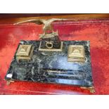 A FRENCH EMPIRE STYLE MARBLE AND BRASS INKSTAND