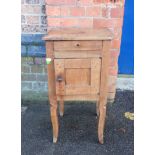 A FRENCH PROVINCIAL FRUITWOOD BEDSIDE CUPBOARD