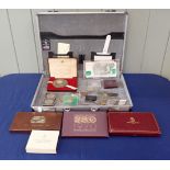 A COLLECTION OF SPECIMEN COIN SETS