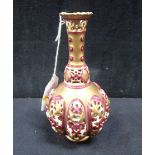 A ZSOLNAY RETICULATED AND GILT VASE