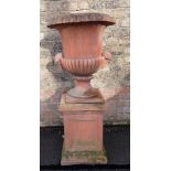 A CAST GARDEN CAMPANA URN AND PEDESTAL