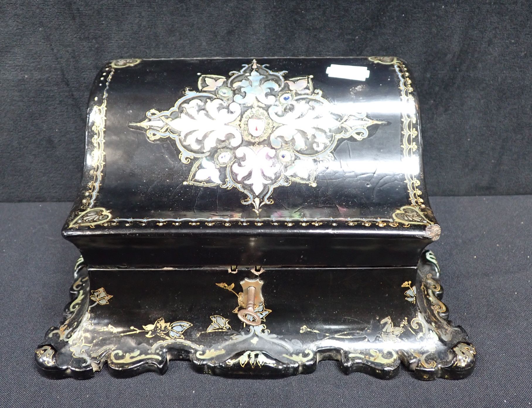 A VICTORIAN EBONISED PAPIER MACHE STATIONERY BOX