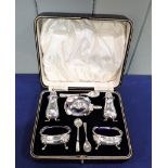 AN EARLY 1930s SOLID SILVER CONDIMENT SET IN ORIGINAL CASE
