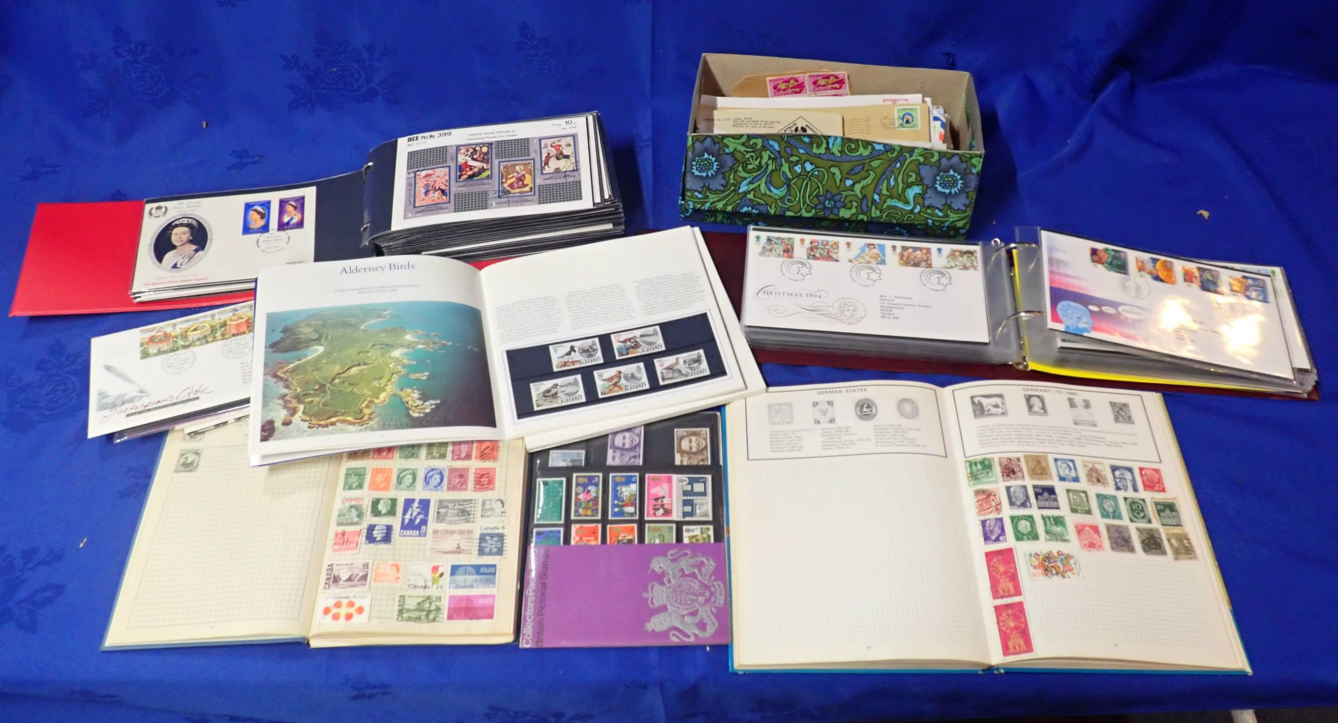 A COLLECTION OF FIRST DAY COVERS AND ASSORTED STAMPS