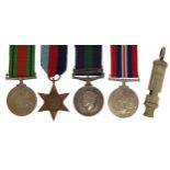 British military World War II four medal group and a whistle, the medal group including a General