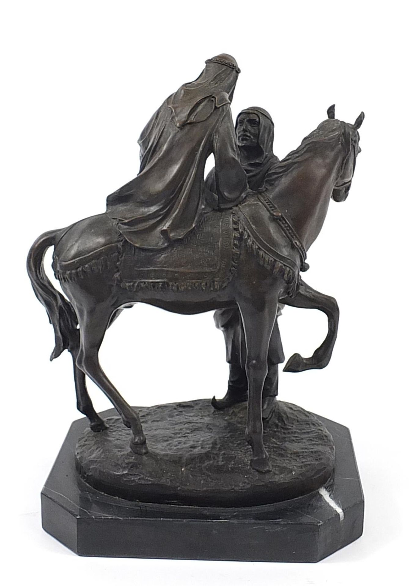 Large patinated bronze study of a Arab gentleman attending a lady, raised on a black marble base, - Image 2 of 3