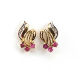 Pair of 9ct gold ruby and diamond stud earrings, 1.6cm high, 1.6g