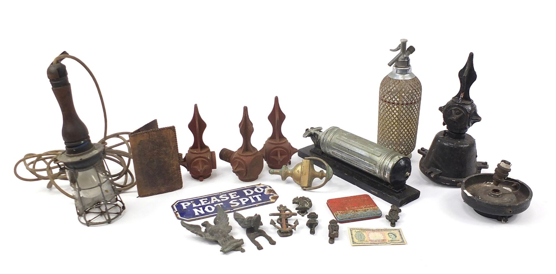 Sundry items including Victorian cast iron street lamp finials, brass door knockers, Pyrene fire
