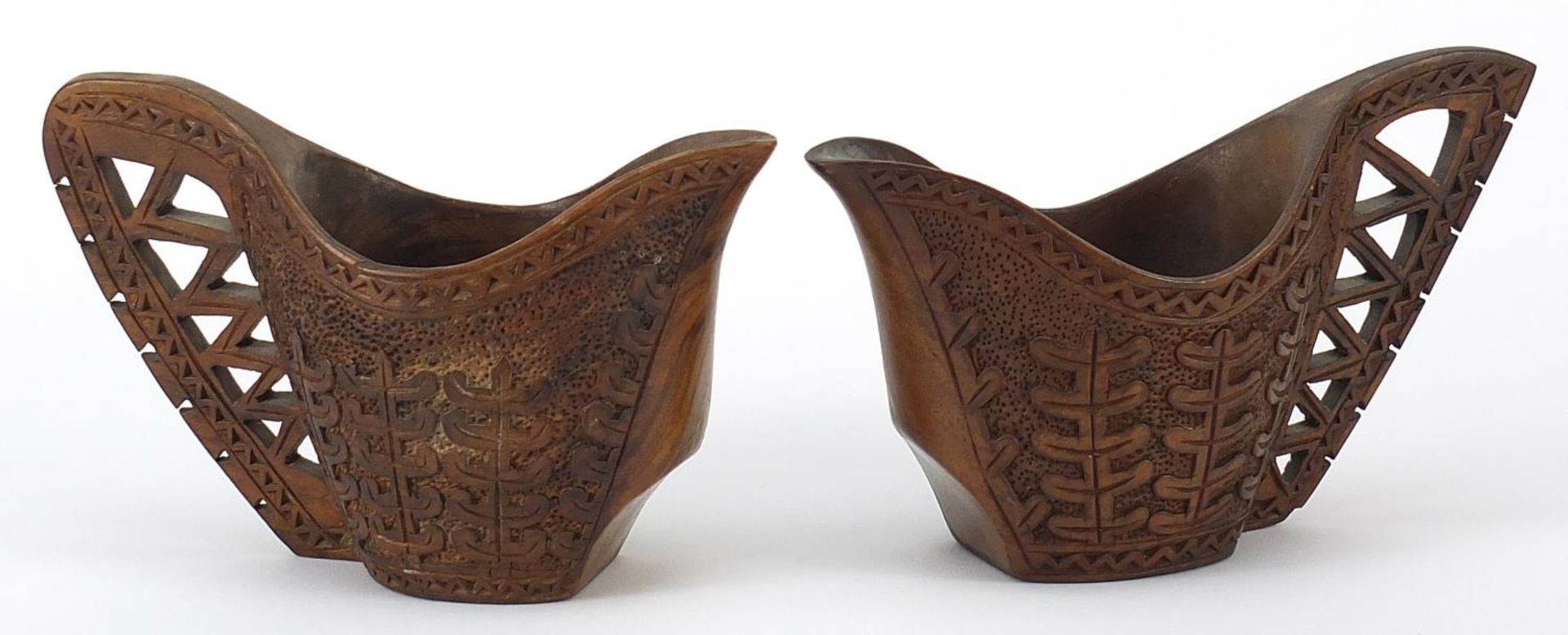Pair of Scandinavian carved hardwood cups, the largest approximately 15.5cm