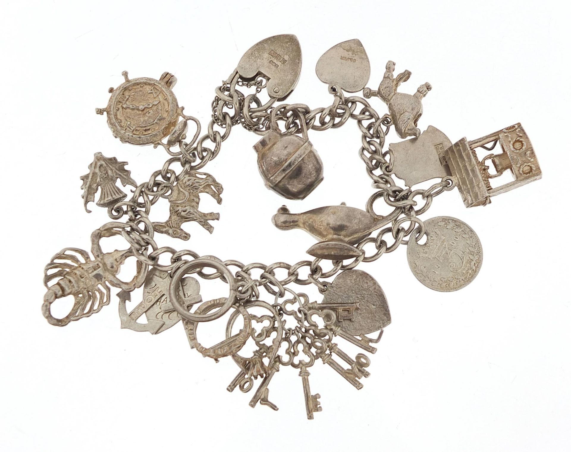 Silver charm bracelet with a selection of mostly silver charms, 49.0g - Bild 4 aus 5