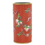 Chinese faux cinnabar lacquer porcelain vase hand painted in the famille rose palette with bats