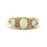 18ct gold cabochon opal and diamond ring, size P, 5.2g