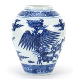 Chinese blue and white porcelain vase hand painted with phoenixes raised on carved hardwood stand,