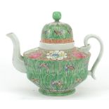 Chinese porcelain teapot hand painted in the famille rose palette with butterflies amongst cabbage