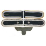 Two pairs of German military interest NCO shoulder straps and a breast eagle