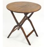 Antique elm folding table, 59cm high x 56cm in diameter