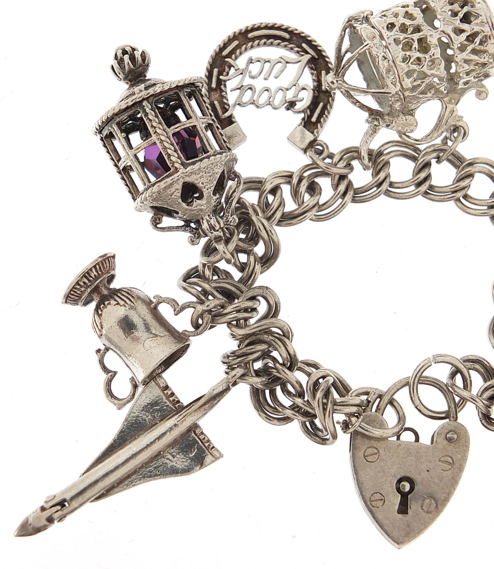 Silver charm bracelet with a selection of mostly silver charms including Concorde, 16cm in length, - Bild 2 aus 5